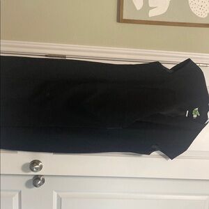 Black knee-length Calvin Klein wrap style  dress with cap sleeves and V-neck
